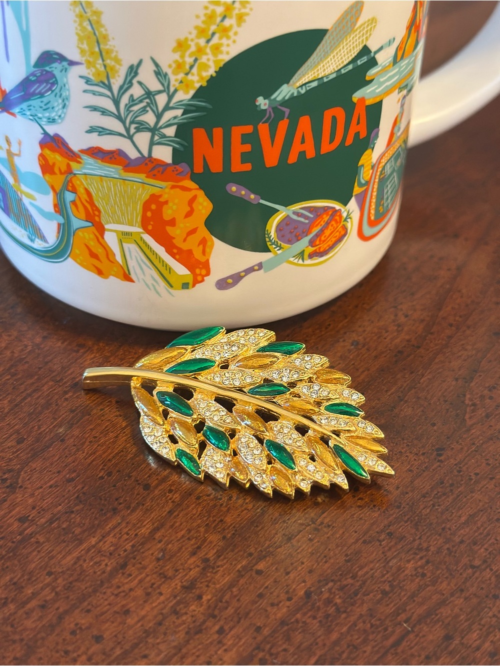 Gold Leaf Brooch with Emerald Green Accents